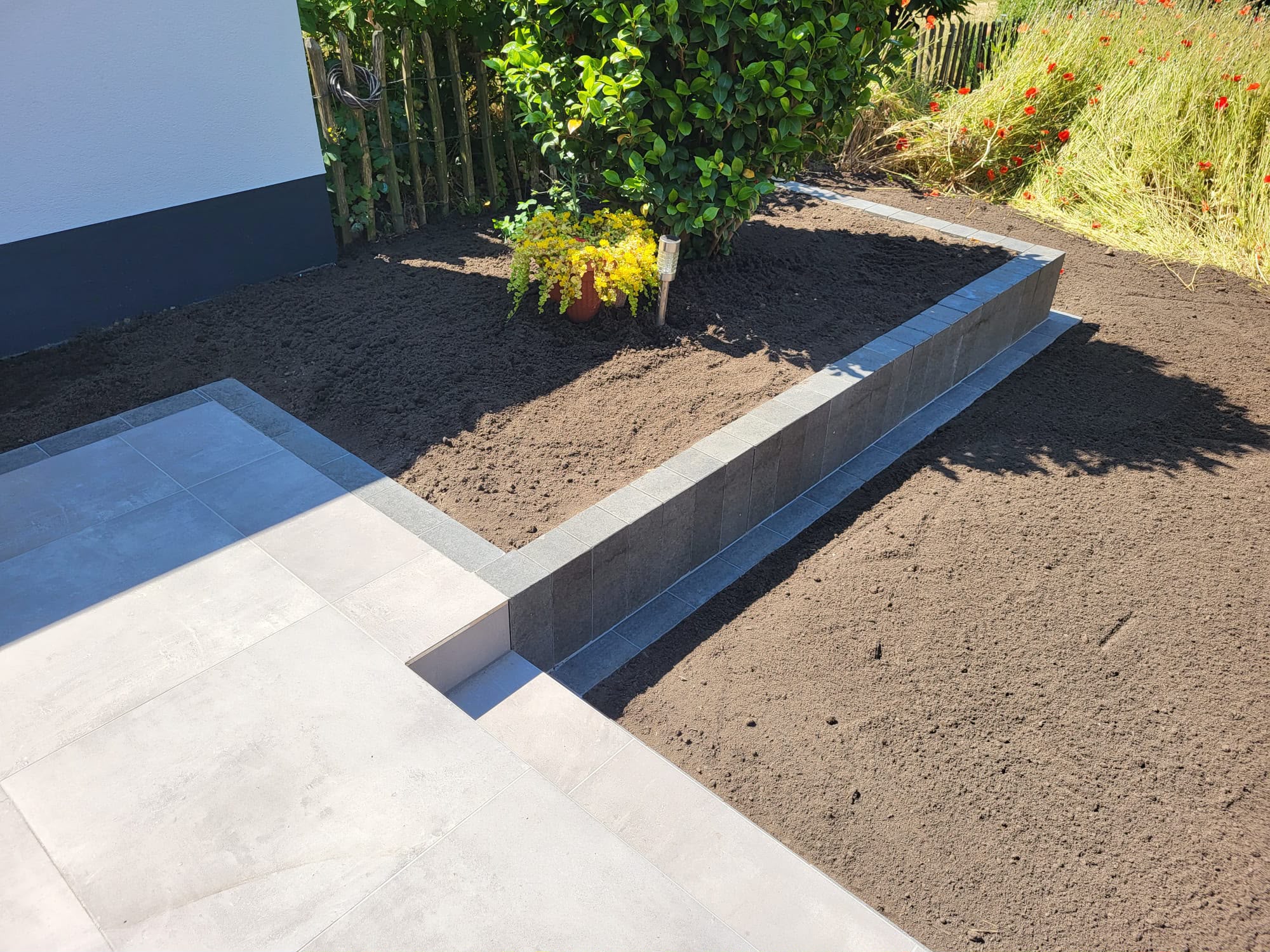 Palisaden setzen in Datteln – Hangsicherung, Beetbegrenzung und Gartengestaltung im Vest Recklinghausen